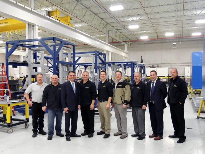 Mark Hackel with the Baker Industries team during a tour of Baker's Macomb, Michigan facilities